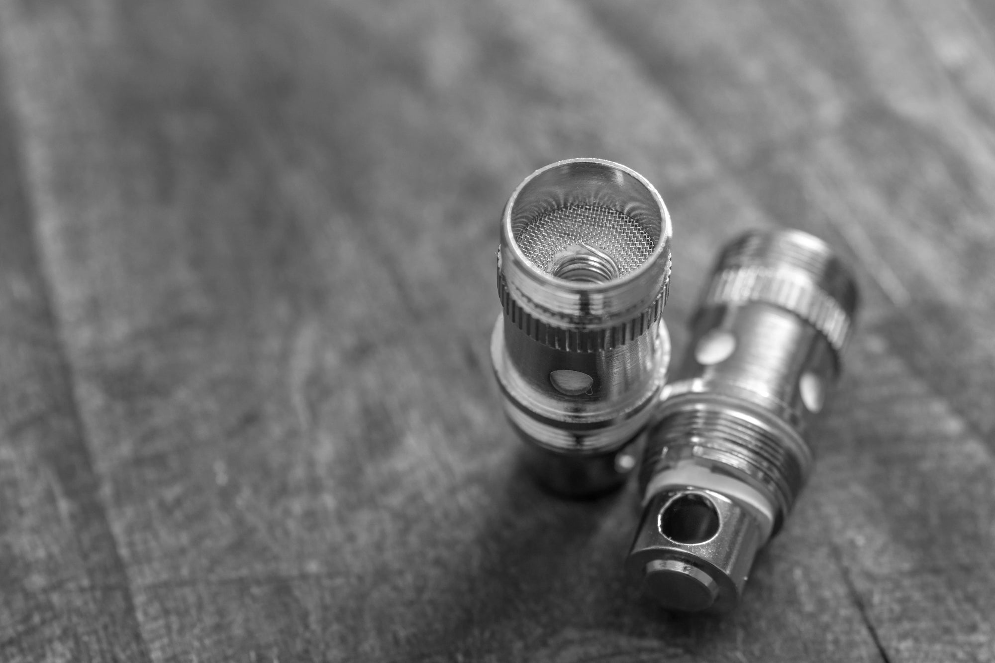 Black and white close-up image of a vape coil