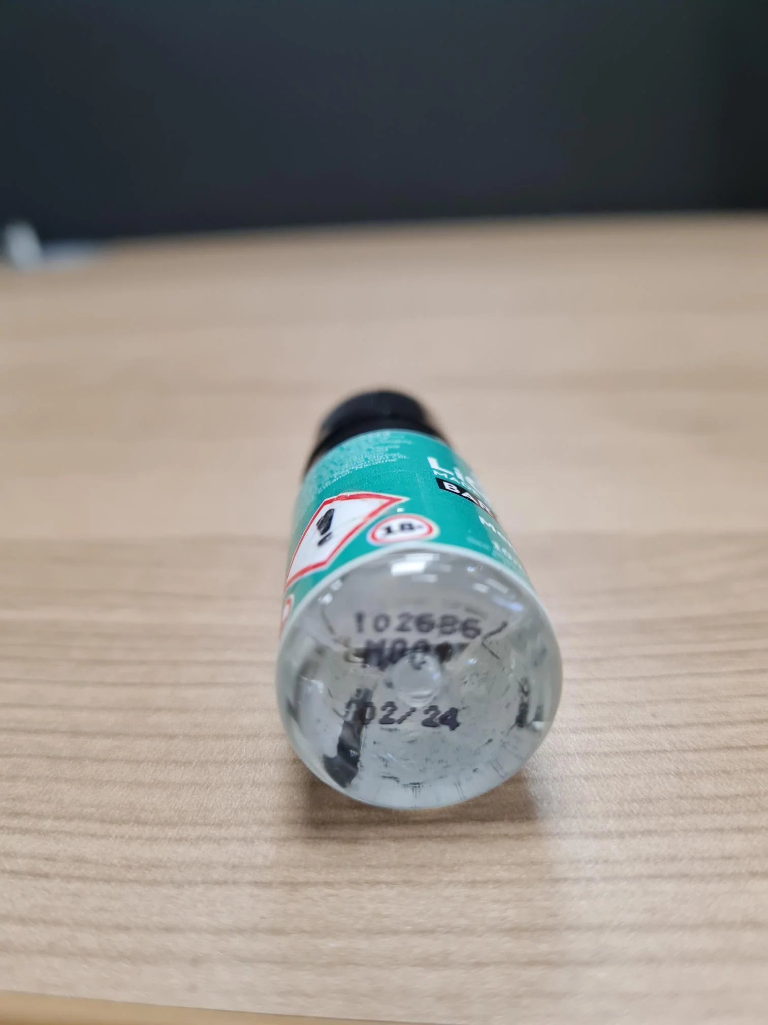 LiQuid e-liquid turned over to show use-by date