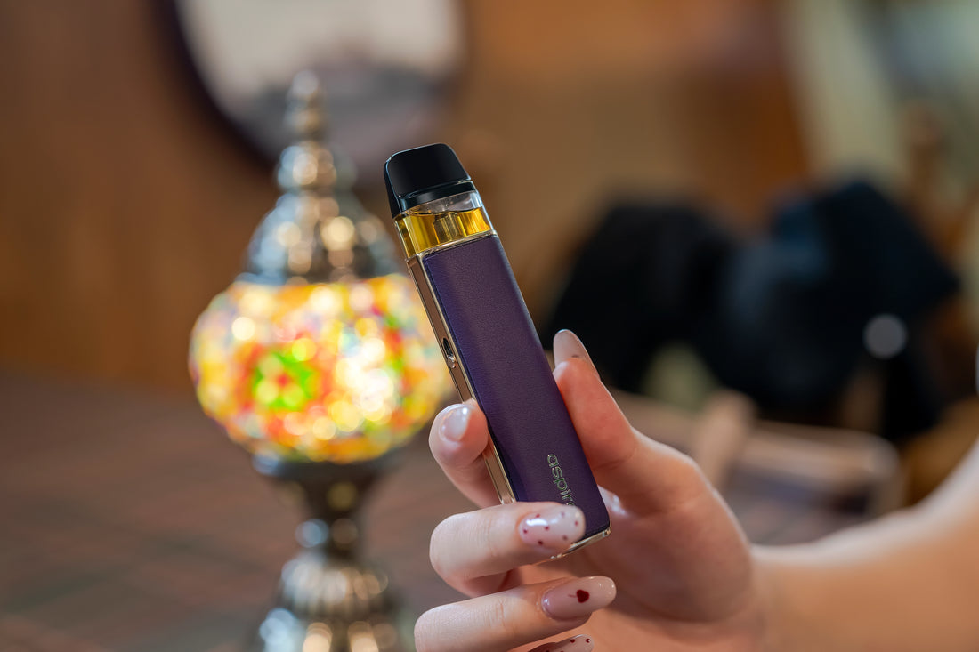 Purple Aspire Loomix device in someone's hand