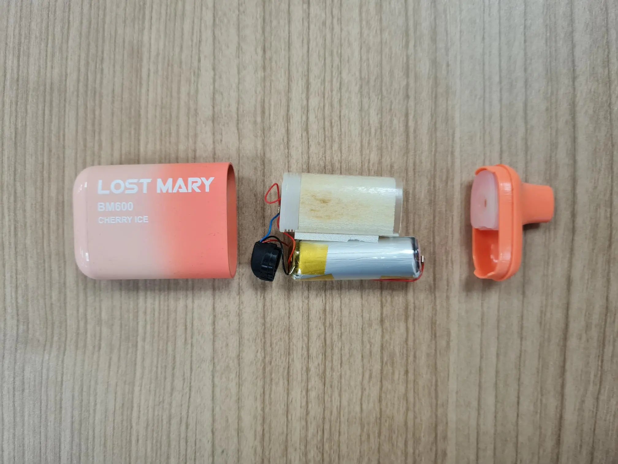Image of a Lost Mary Disposable Vape Kit With Its Internal Workings Exposed