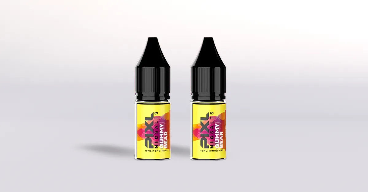 Two PIXL Gummy Bear nicsalts vape juice bottles with colorful labels on a light gray background