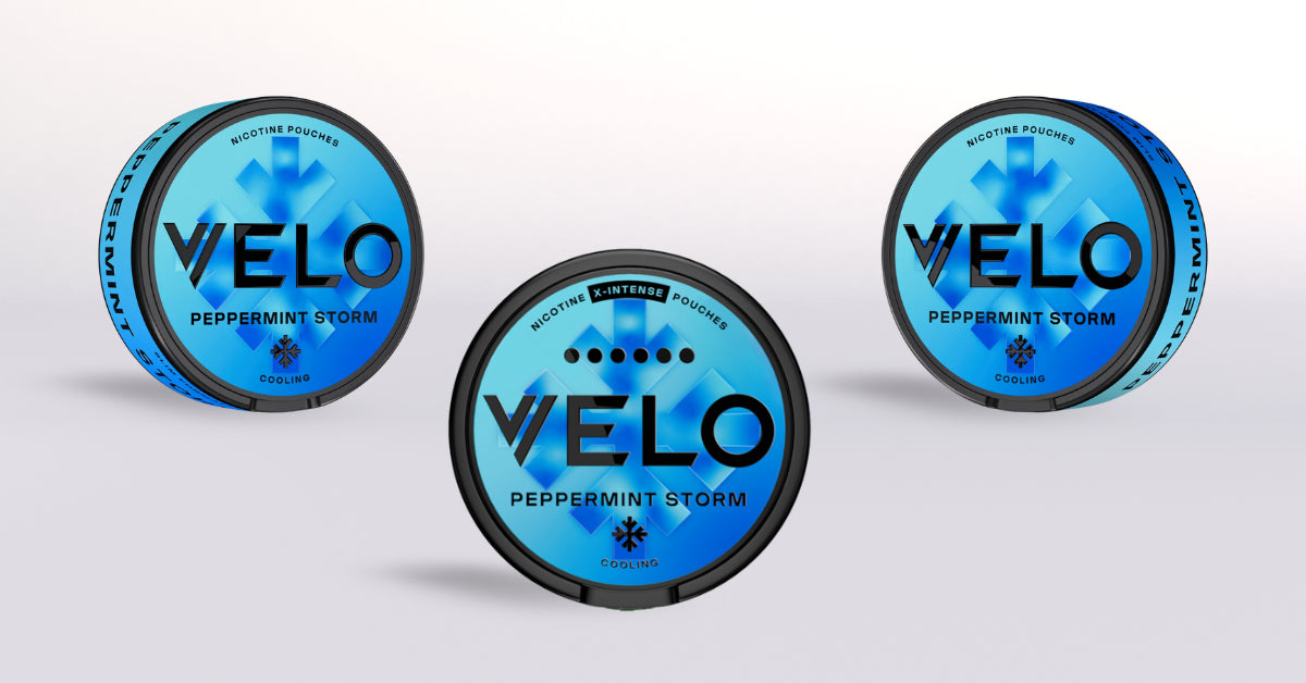 Three containers of Velo Peppermint Storm nicotine pouches on a white background