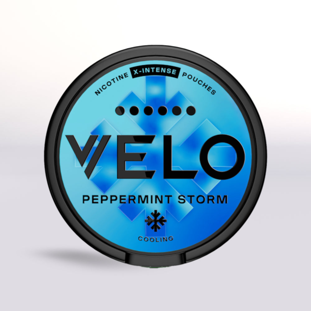 VELO peppermint storm nicotine pouch container with blue design on a light gray background