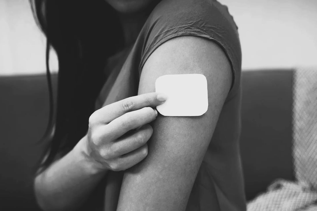 Person with a nicotine patch on their arm