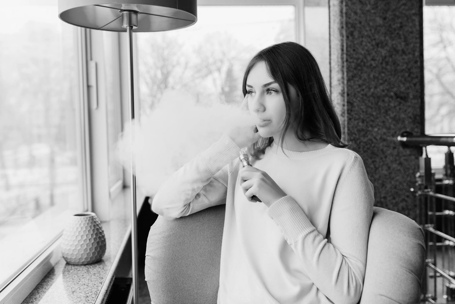 A person vaping indoors